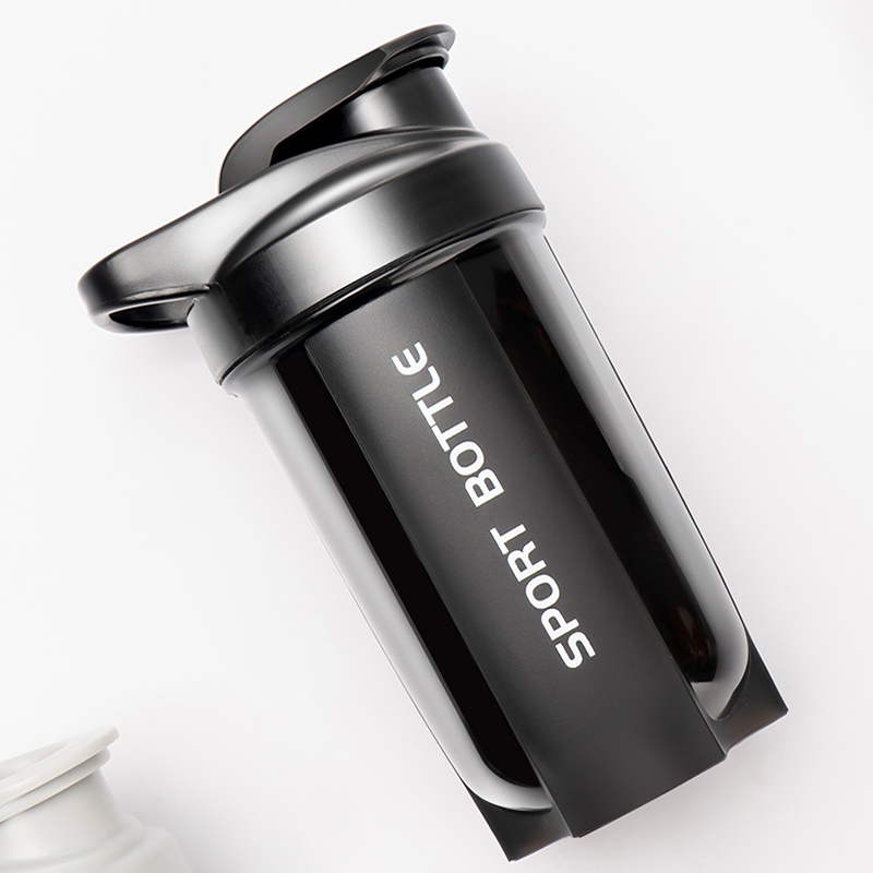 Nutrition And Fitness - Przenośna butelka z shakerym do białek